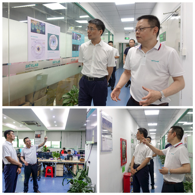 热烈欢迎哈尔滨市香坊区委副书记、区长黄晓伟一行赴天工测控走访调研.jpg 热烈欢迎哈尔滨市香坊区委副书记、区长黄晓伟一行赴天工测控走访调研.jpg